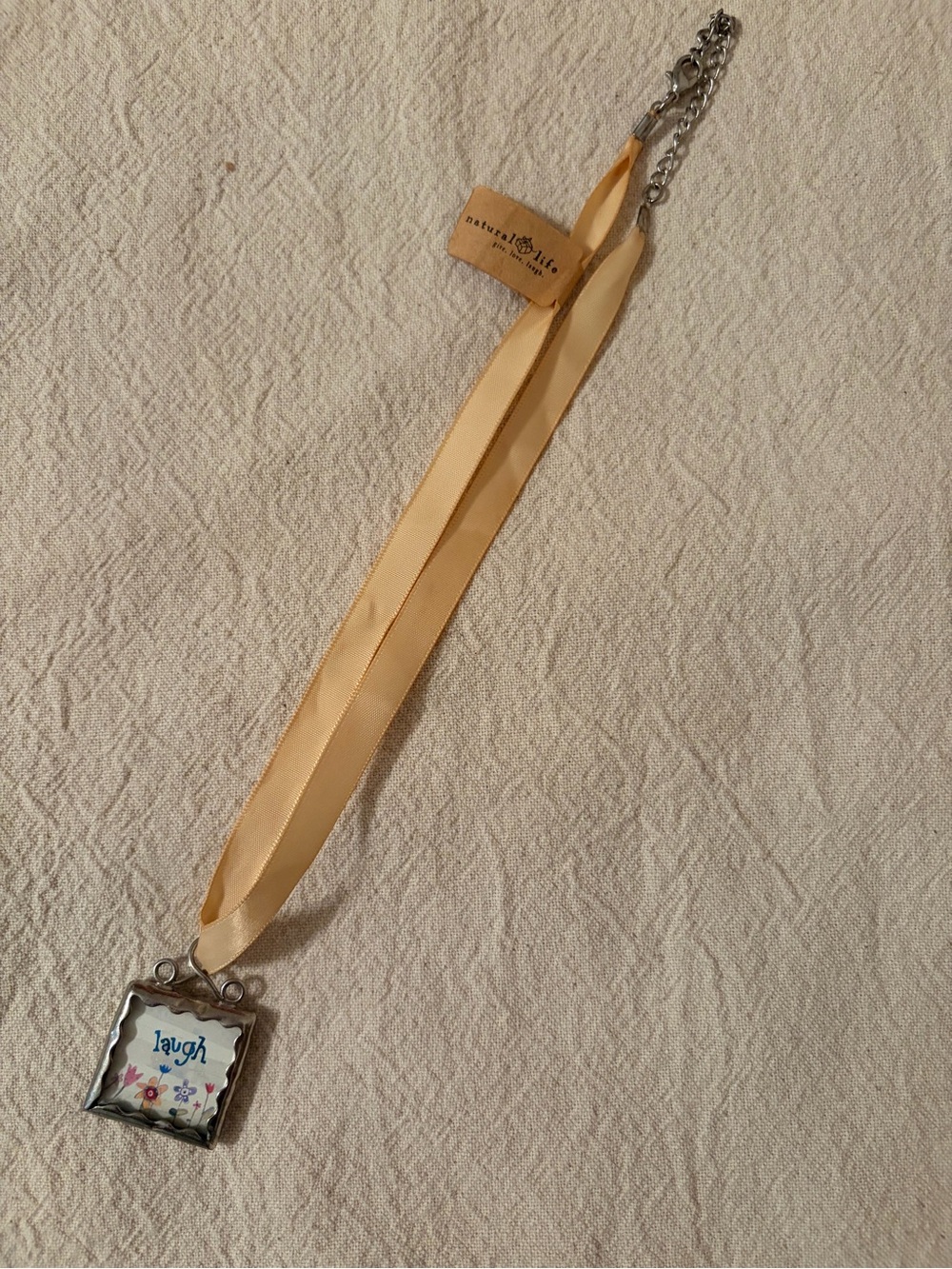NATURAL LIFE CHARM RIBBON NECKLACE